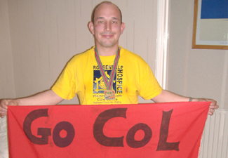 Colin Nightingale with banner